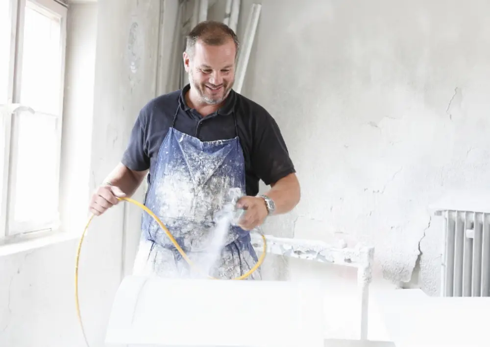 Man Spray Painting Timber 2024 06 20 02 57 46 Utc