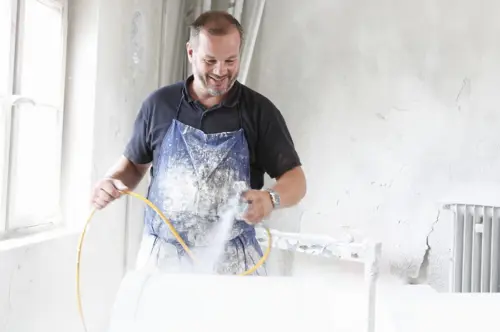 Man Spray Painting Timber 2024 06 20 02 57 46 Utc