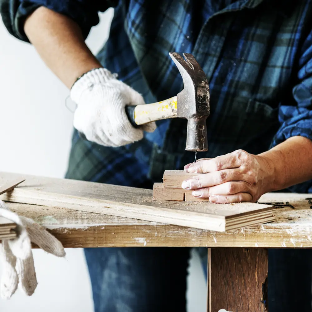 Woman Carpenter Using Hammer Pushing Nail On A Woo 2025 02 10 11 18 56 Utc