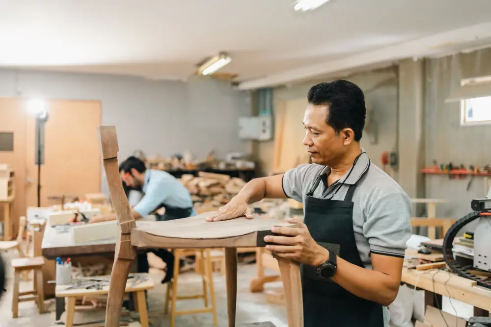 Carpenter Working With Wooden Plank In Workshop M 2025 03 26 00 31 53 Utc