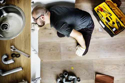 Man Fixing Kitchen Sink 2025 02 09 23 56 29 Utc